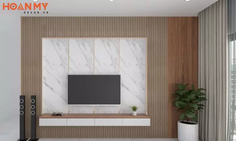 Bố trí vách tivi phòng khách hiện đại bằng nhựa PVC giả đá đẹp